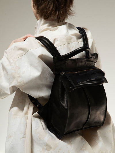 vegetable tanned leather designer backpack