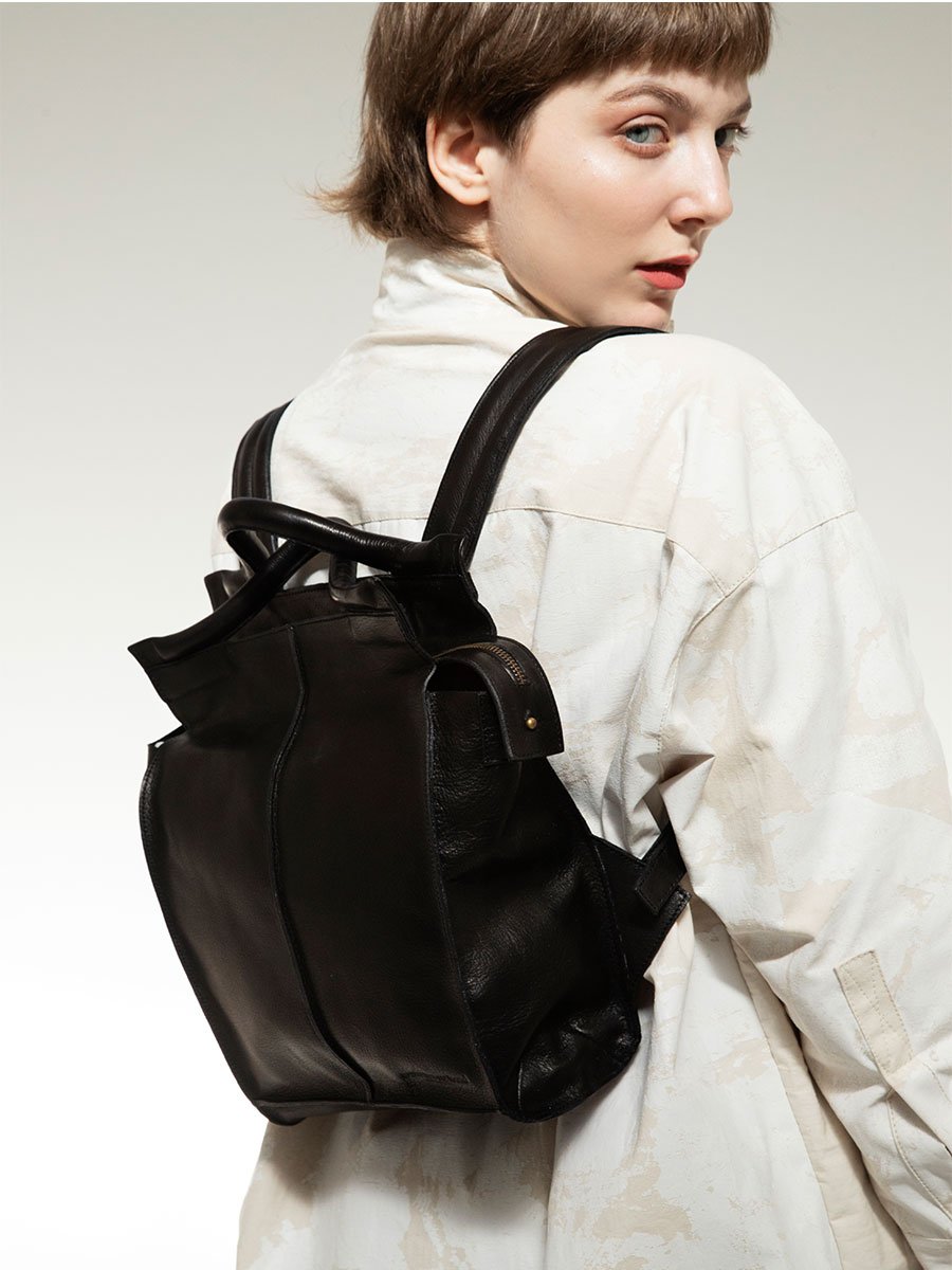 Designer Vegetable tanned leather backpack to tote bag