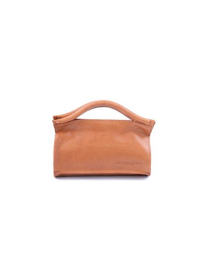 Vegetable tanned designer leather mini bag