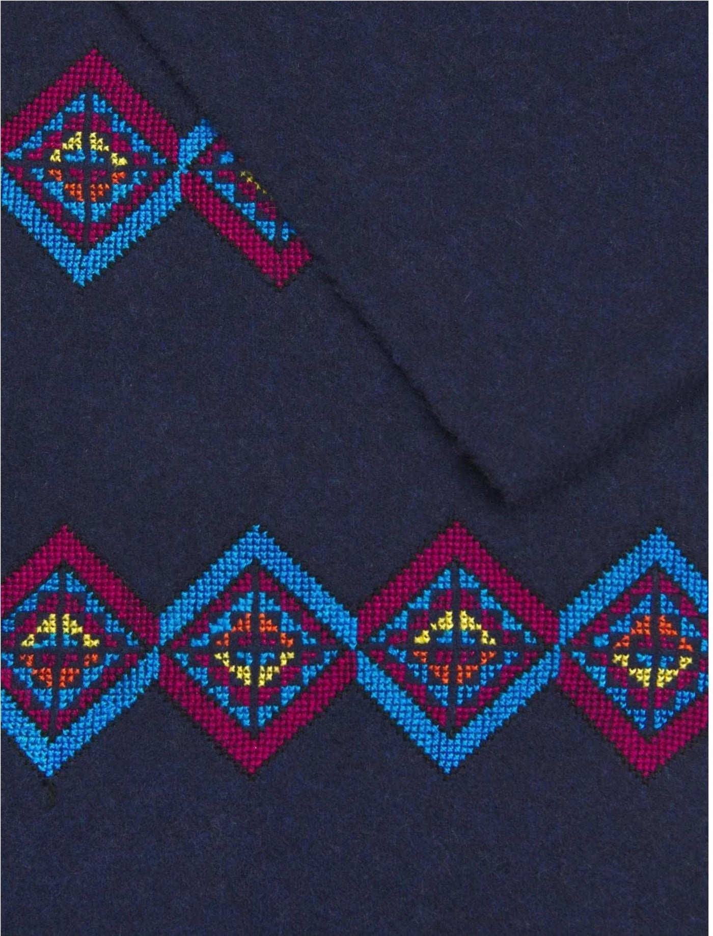 stunning wool scarf featuring hand embroidered pattern