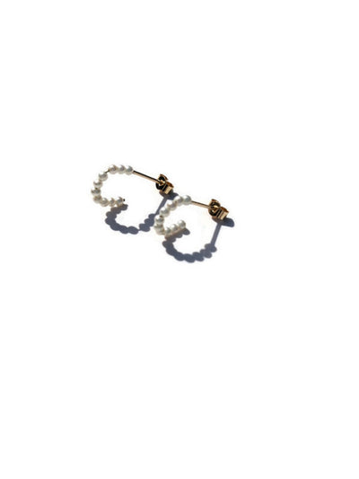 Tiny pearl hoops in 9ct gold