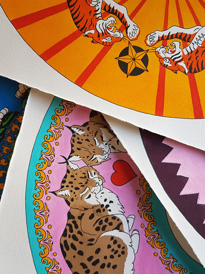 Image of the original designs on paper for the whole Cool Cats collection. 